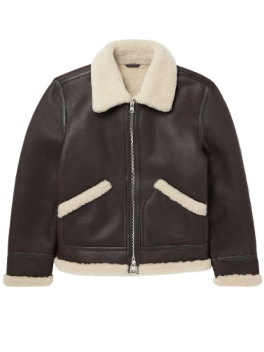 Front view of a premium aviator-style jacket in a rich dark chocolate brown. It boasts a prominent cream-colored sheepskin collar, matching sheepskin trim on the cuffs, waistband, and the opening of two angled front pockets, secured with a sturdy silver zipper.