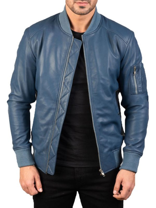 Blue leather jacket worn by a person on a white background