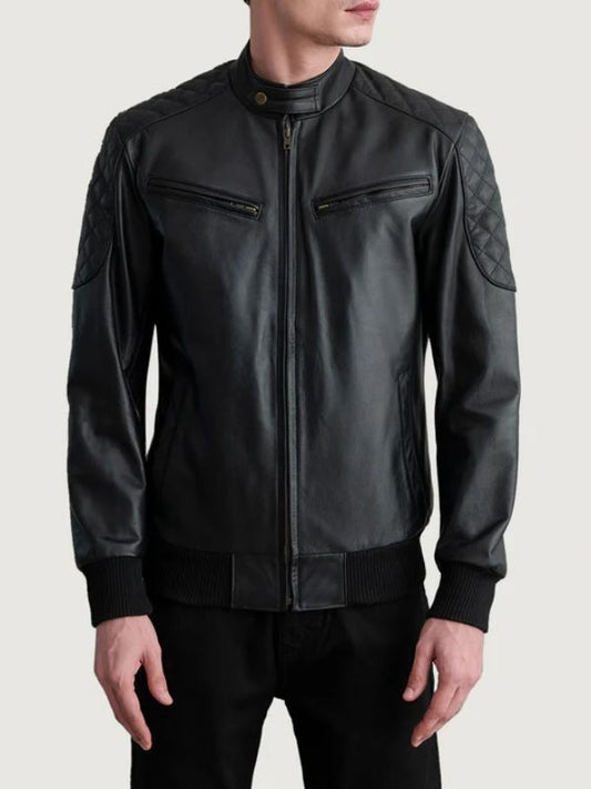 Black leather jacket worn by a person on a light gray background
